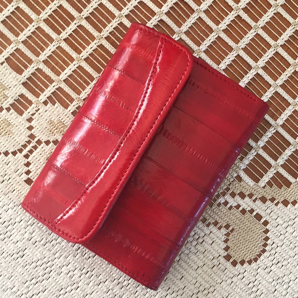Red genuine eel skin leather wallet. Never used.